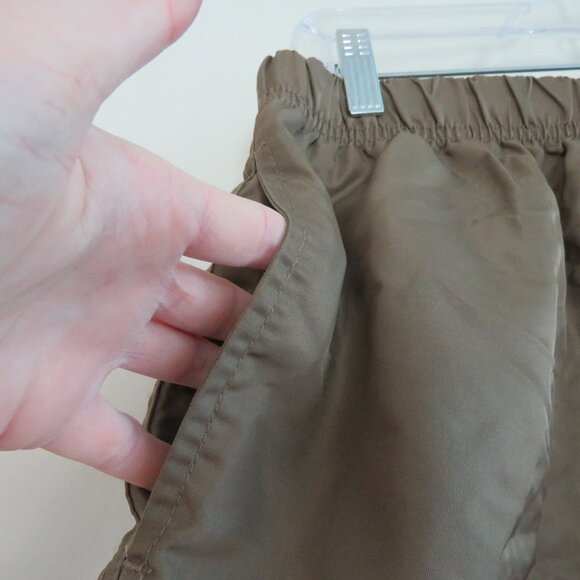 ESSENTIALS FEAR OF GOD Straight Leg Logo Appliquéd Shell Drawstring Shorts Khaki - Picture 9 of 16